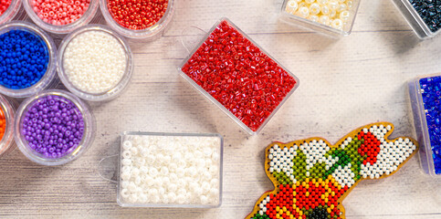 Colorful glass beads. Variety of shapes and colors to make a bead necklace or a string of beads for women