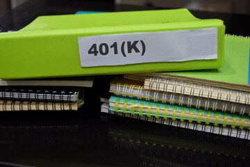 Folders with the label 401K. Business management concept