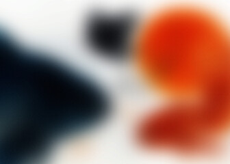 Abstract blurry shapes with dark blue and vibrant orange on white background