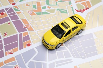 Road trip concept. Car model on city map
