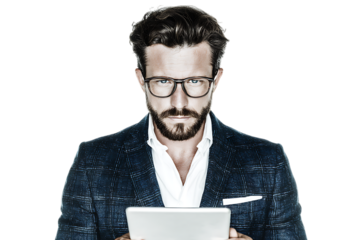 Serious businessman using a tablet.