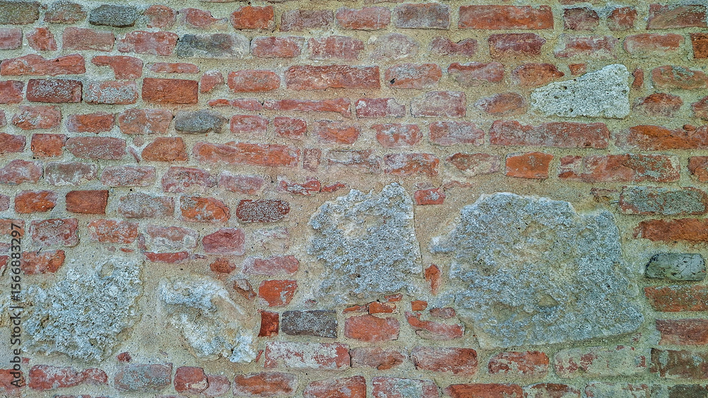 Poster textured red brick wall with stone elements design patterns