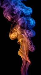 Obraz premium Colorful smoke rising against a black background with blue purple and orange hues in a vertical shot