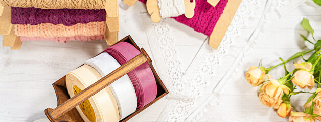 Colored ribbons and lace in coils for hobbies