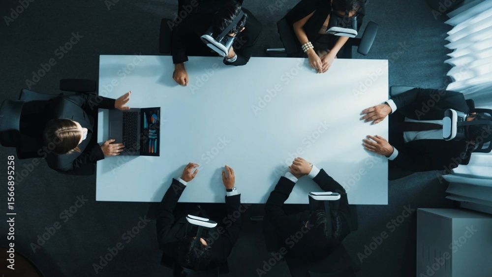 Poster top down aerial view of professional business team wear vr headset to enter virtual world while sitt