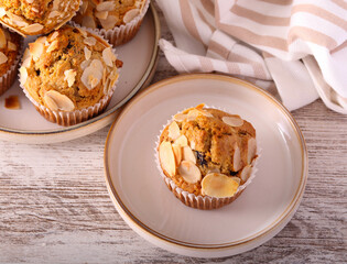 whole meal muffins with fruit and almond topping