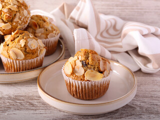 whole meal muffins with fruit and almond topping