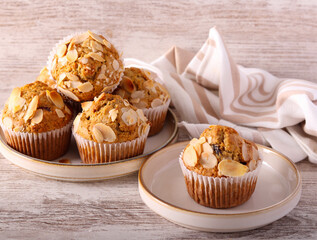 whole meal muffins with fruit and almond topping