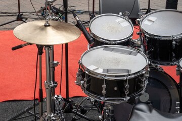 Drum set is ready for a concert on red carpet