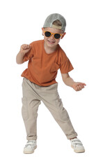 Happy little boy with sunglasses dancing on white background