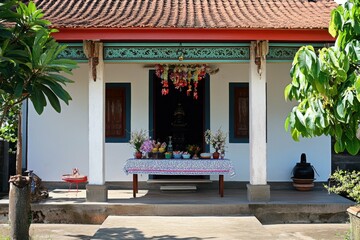 vibrant color image of temple with a table with decorations