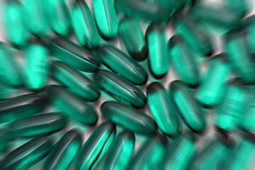 zoomed close up of pills on white background