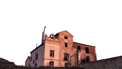 Haunted house at dawn.