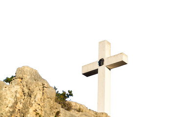Stone cross outdoors in the cliff