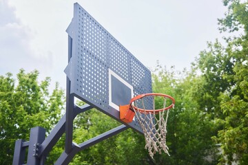 A basketball basket for playing with a ball. Street sports