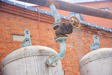 Old industrial boilers at the factory. Close-up