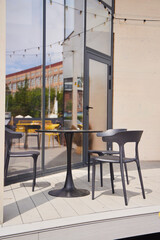Tables and chairs on the street, cafe in the park