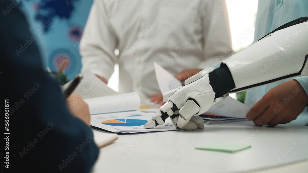 Poster a futuristic robot arm points to business data and charts during a collaborative meeting, showcasing