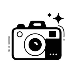 Simple black and white cartoon illustration of a camera with sparkles