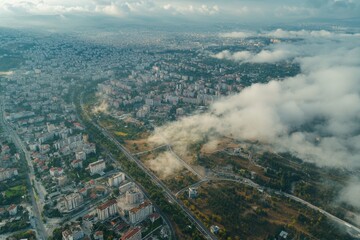 Explore the sprawling city landscape of Tirana, Albania from above during a cloudy day, Aerial view around the city Tirana in Albania on a cloudy day in autumn
