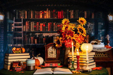 maximalist autumn scene with sunflowers pumpkins candy corn and burning candles with old library background