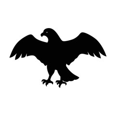 Black silhouette of an eagle spreading its wings ready to fly or pounce