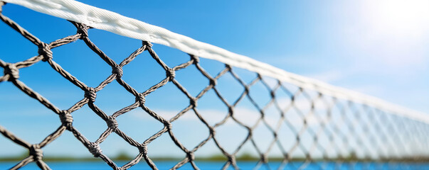 Modern tennis net on a vibrant blue hardcourt with bright studio lighting highlighting its clean white trim