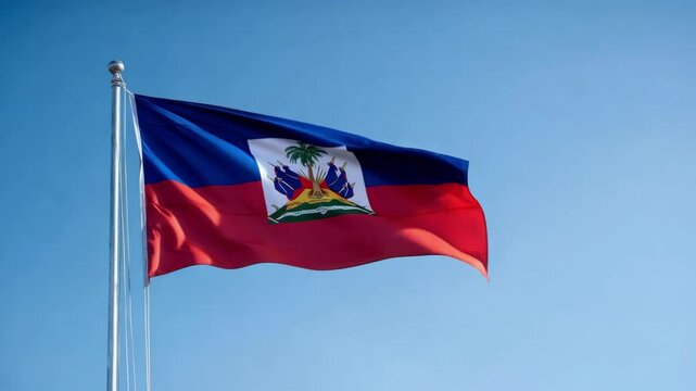The vibrant colors of the Haiti flag wave gently in the breeze, representing the country’s rich history and cultural significance.