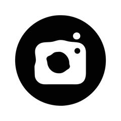 Monochrome circular icon featuring a stylized camera on a black background