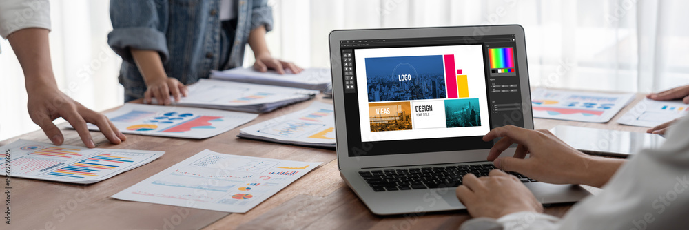 Poster Graphic designer software for modern design of web page and commercial brisk ads showing on the computer screen