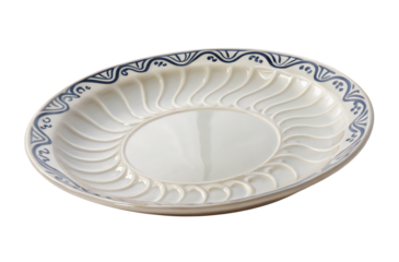 Elegant white plate with blue floral pattern and textured design on the rim and smooth center