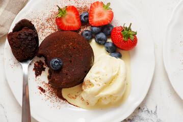 Chocolate Fondant with Vanilla Ice Cream and Strawberries
