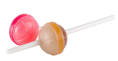 Two colorful lollipops with pink and caramel colors on white background with reflection visible