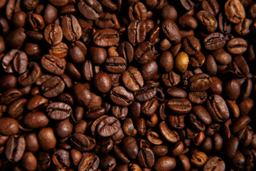 Roasted coffee beans close-up background