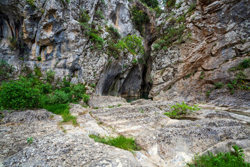 Textured cliffs and cave, Saint Luke Gorge