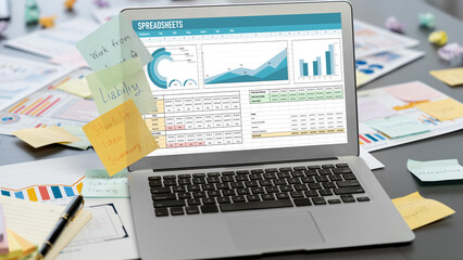 Sticky note for creative and analytic brainstorm for business idea with BI data dashboard on laptop...