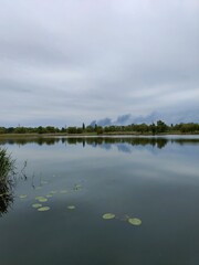 Fototapeta premium clouds over the river