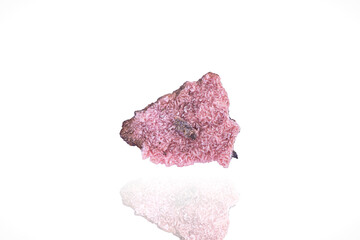Pink Rhodochrosite crystals. Specimen from N'Chwaning 2, South Africa. photography isolated on white blackground. macro detail background. close-up mineral crystal unpolished semi-precious gemstone.