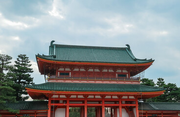The magnificent Otenmon, the main gate of Heian Shrine, showcases its vibrant vermilion pillars and...