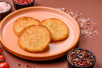 Hash browns, a breakfast food made of potatoes, onions and vegetables. Hash browns with potatoes