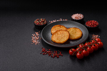 Hash browns, a breakfast food made of potatoes, onions and vegetables. Hash browns with potatoes