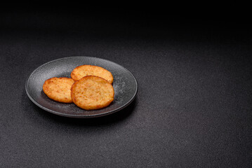Hash browns, a breakfast food made of potatoes, onions and vegetables. Hash browns with potatoes