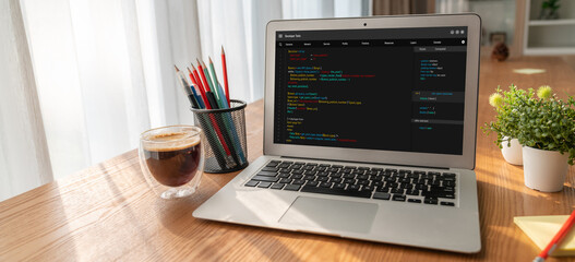 Software development programming on computer screen for modish application and program coding