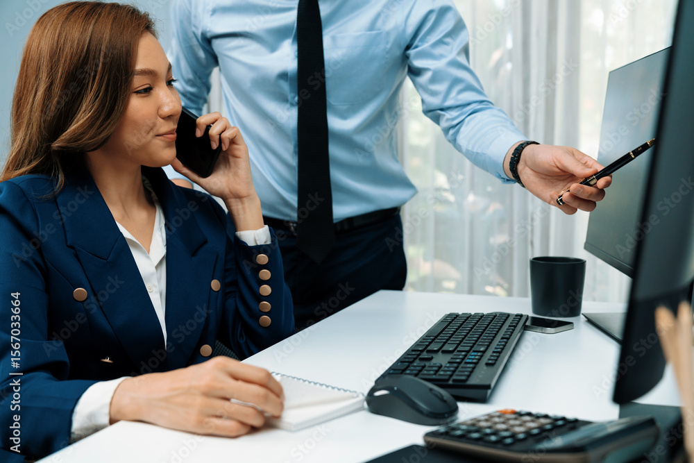 Poster businesswoman calling with business partner on mobile phone while calculating stock exchange value d