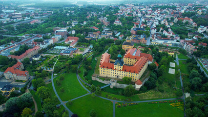 Aerial view of the old town of the city Zeitz in Germany on a cloudy and rainy afternoon in spring	
