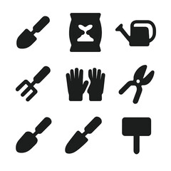 Garden Tools Icons. Solid, filled icon set of potting tools: small shovel, potting soil bag, watering can, hand rake, gloves,