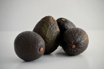 Hass Avocados on White table 