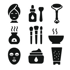 Spa Essentials Icons. Solid, filled icon set of spa facial essentials: towel wrap, facial oil, massage roller, aroma diffuser,