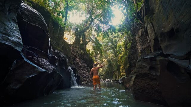 Travel people explore Bali famous landmark and popular travel destination Bali Waterfall Kanto Lampo Indonesia 4K 