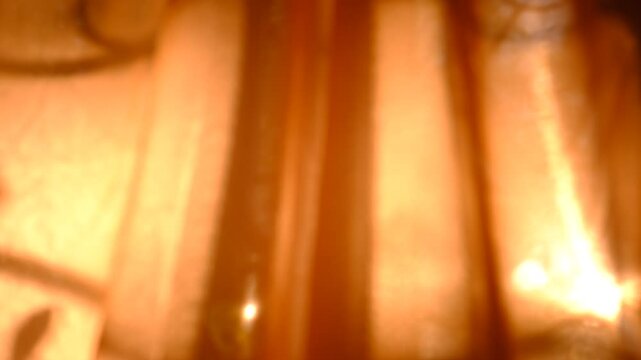 Soft blurred shadows on beige. Window and sunset sunlight, overlay shadow on warm beige background. Minimal style, copy space, template. Sunny autumn style aesthetics. Video transition